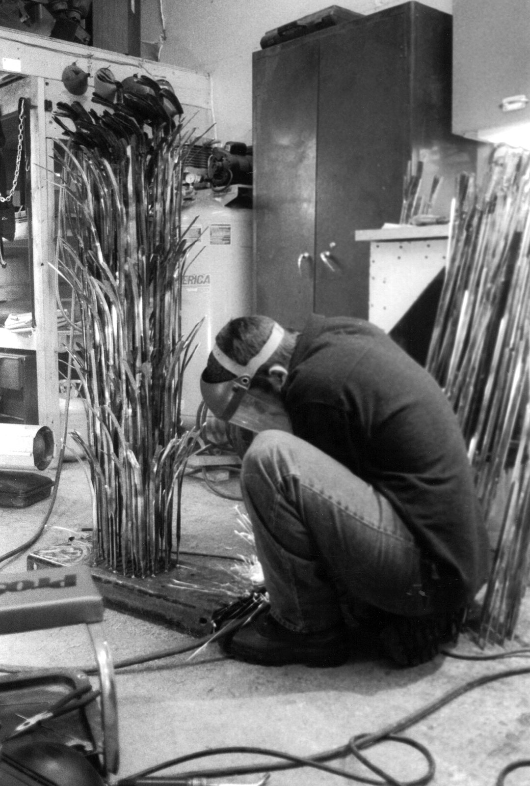Andy Baack welding the sculpture.